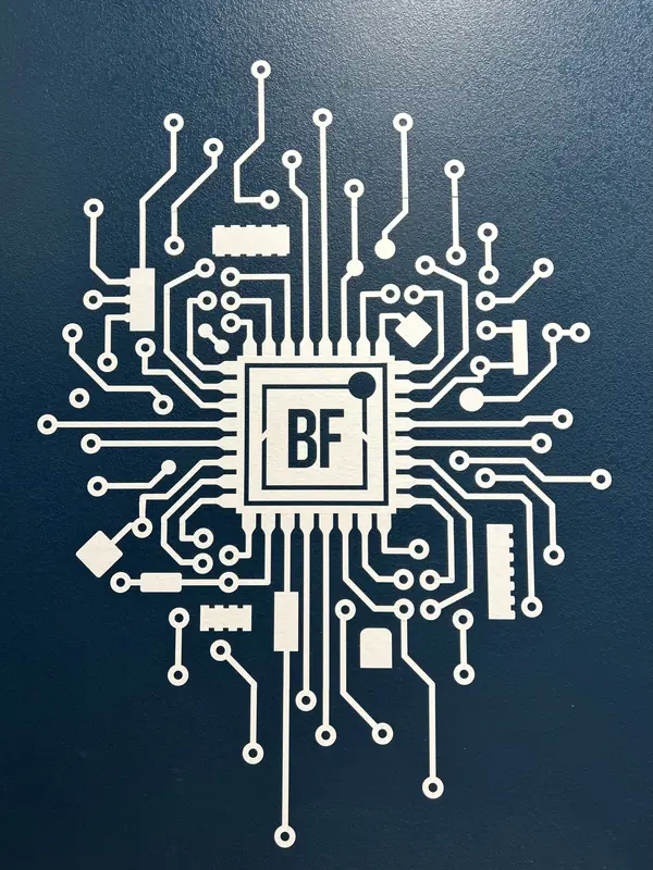 The Foundry’s circuit-board mural, its traces running out from the BF mark at the centre